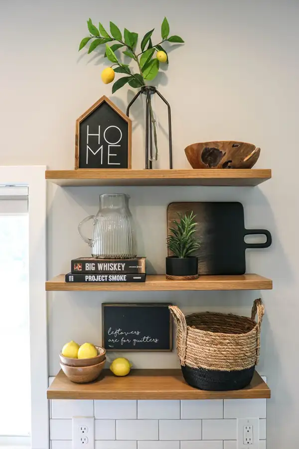 A small shelving unit filled with various décor items to bring atmosphere to the home.