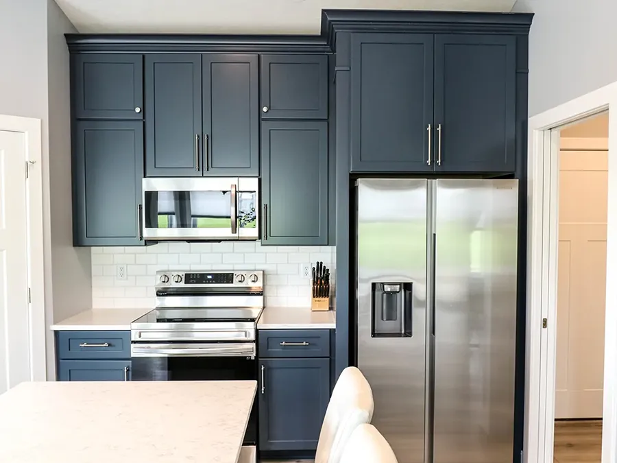 Gravel Lane Design Studio - deep blue painted kitchen cabinets - Eureka, IL