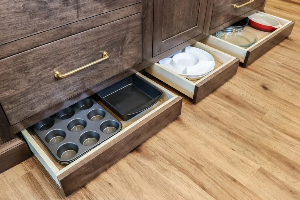 GRAVEL LANE DESIGN - Kitchen Features Our Designers Are Currently Obsessed With - kitchen cabinets with toe-kick storage.