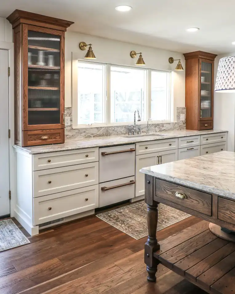 GRAVEL LANE DESIGN - Mixing Old & New: A Tour of This Charming Home Remodel - beautiful remodel of a kitchen with cabinets, a dishwasher, and a bright window over a sink
