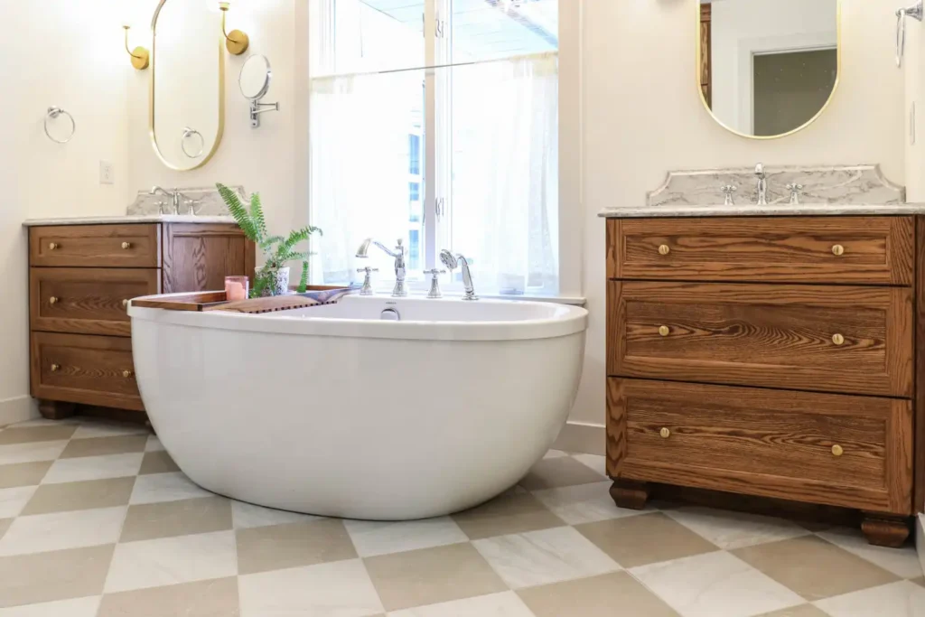 GRAVEL LANE DESIGN - Mixing Old & New: A Tour of This Charming Home Remodel - beautiful remodel of a bathroom with a domed tub