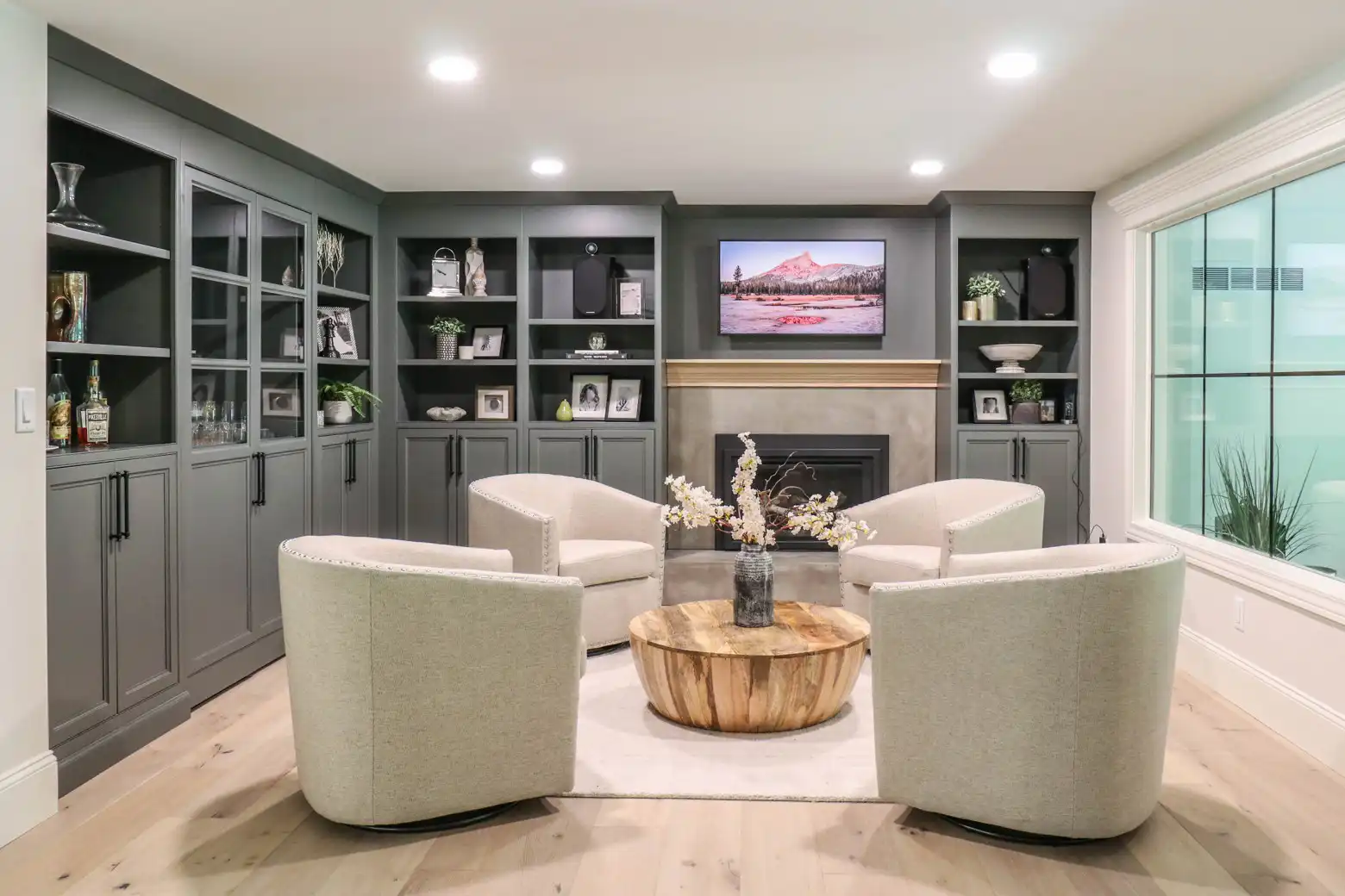 GRAVEL LANE DESIGN - Interior Design Principles and How to Apply Them to Your Home: a beautiful living room with sage green bookcases