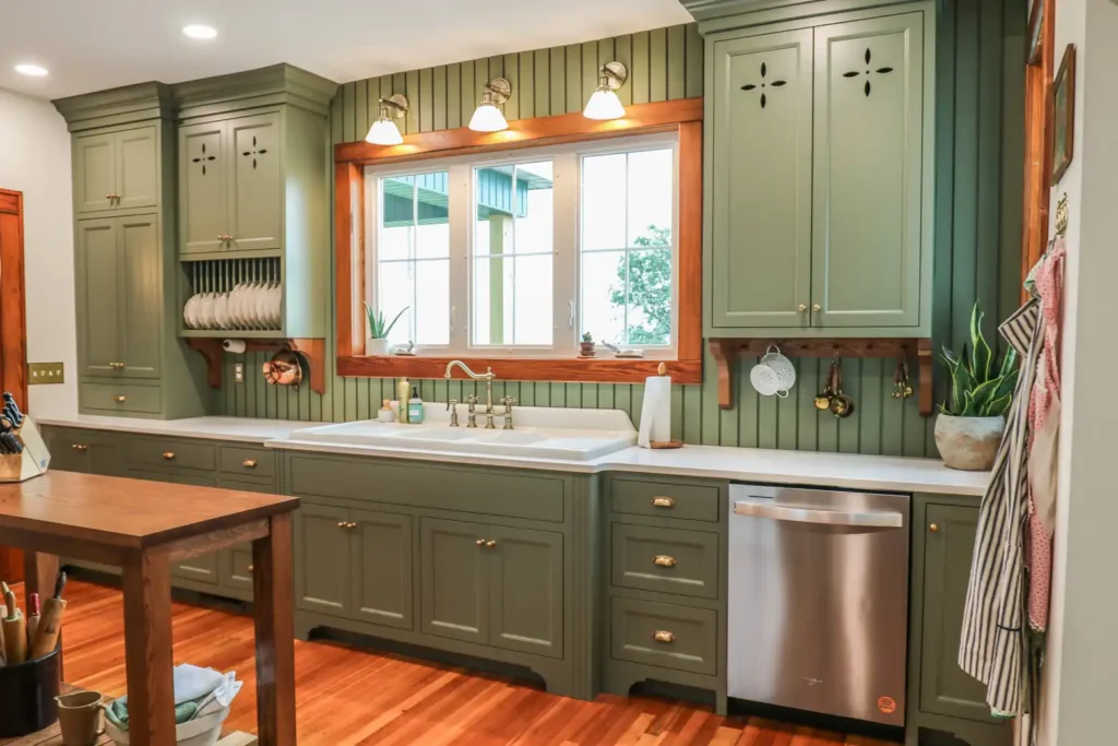 GRAVEL LANE DESIGN - Interior Design Principles and How to Apply Them to Your Home: A beautiful kitchen with green cabinets and green wallpaper.
