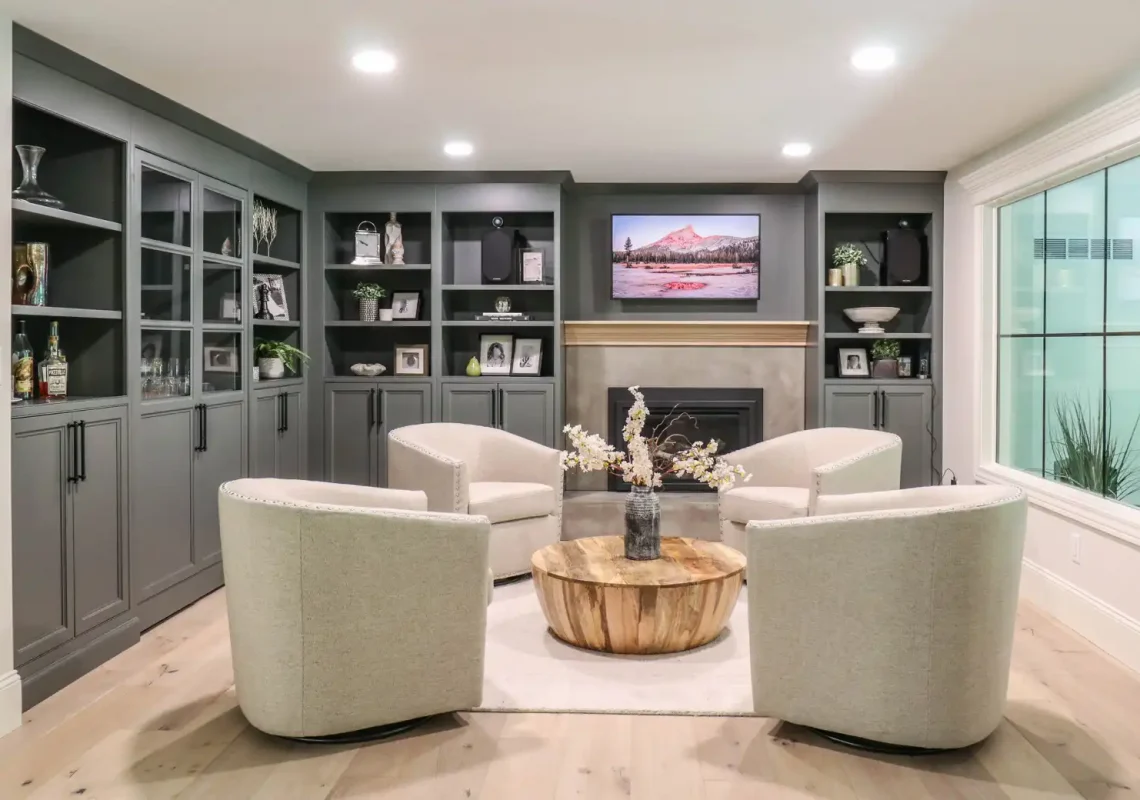 GRAVEL LANE DESIGN - Interior Design Principles and How to Apply Them to Your Home: a beautiful living room with sage green bookcases